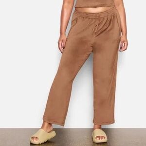 Skims Velour Track Pants in Sienna